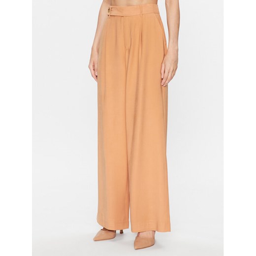 DKNY Spodnie palazzo P3EK8Q84 Pomarańczowy Regular Fit ze sklepu MODIVO w kategorii Spodnie damskie - zdjęcie 182652153