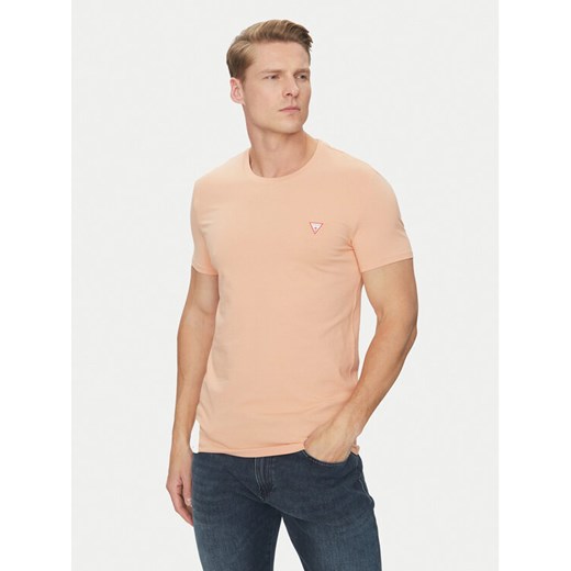 Guess T-Shirt M2YI24 J1314 Pomarańczowy Slim Fit ze sklepu MODIVO w kategorii T-shirty męskie - zdjęcie 182652170