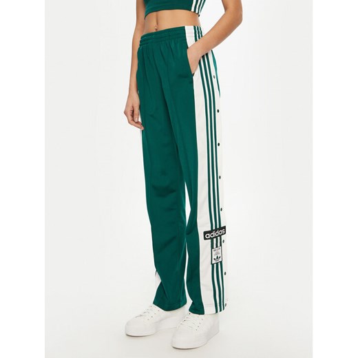 adidas Spodnie dresowe Adibreak JD0852 Zielony Loose Fit ze sklepu MODIVO w kategorii Spodnie damskie - zdjęcie 182652524