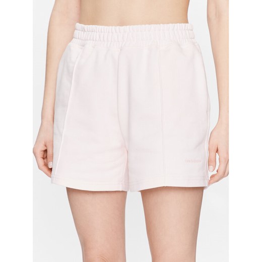 New Balance Szorty sportowe WS23552 Różowy Relaxed Fit ze sklepu MODIVO w kategorii Szorty - zdjęcie 182652590