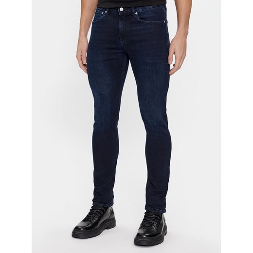 Calvin Klein Jeans Jeansy J30J323695 Granatowy Skinny Fit ze sklepu MODIVO w kategorii Jeansy męskie - zdjęcie 182652880