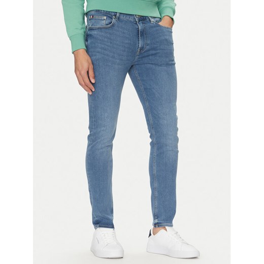 Tommy Hilfiger Jeansy Bleecker MW0MW38823 Niebieski Slim Fit ze sklepu MODIVO w kategorii Jeansy męskie - zdjęcie 182652993