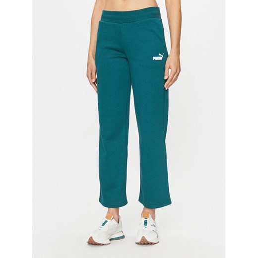 Puma Spodnie dresowe Ess+ 676093 Zielony Regular Fit ze sklepu MODIVO w kategorii Spodnie damskie - zdjęcie 182653263