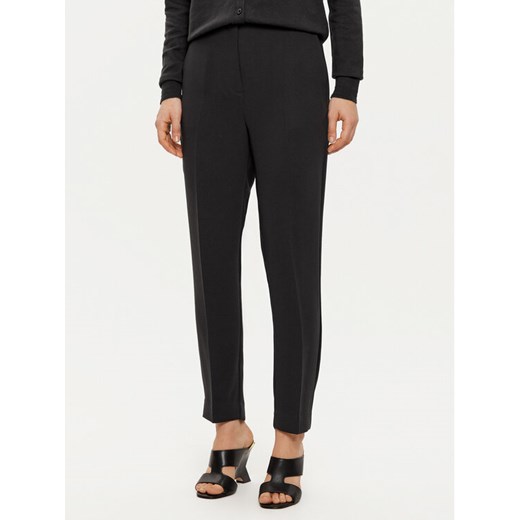 Tommy Hilfiger Chinosy WW0WW45450 Czarny Slim Fit ze sklepu MODIVO w kategorii Spodnie damskie - zdjęcie 182653352