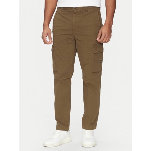 BOSS Spodnie materiałowe Sisla-8 50530599 Khaki Regular Fit ze sklepu MODIVO w kategorii Spodnie męskie - zdjęcie 182654152