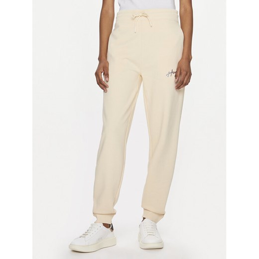 Hugo Spodnie dresowe Easy 50509171 Beżowy Relaxed Fit ze sklepu MODIVO w kategorii Spodnie damskie - zdjęcie 182654172