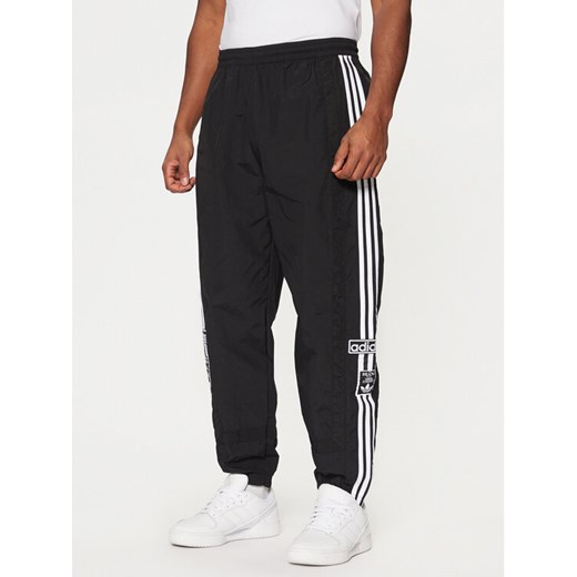 adidas Spodnie dresowe Adibreak JD4257 Czarny Loose Fit ze sklepu MODIVO w kategorii Spodnie męskie - zdjęcie 182655414