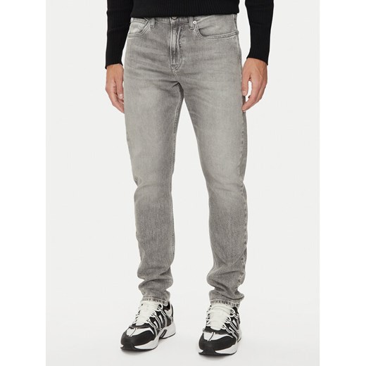 Calvin Klein Jeans Jeansy J30J324833 Szary Slim Fit ze sklepu MODIVO w kategorii Jeansy męskie - zdjęcie 182656793