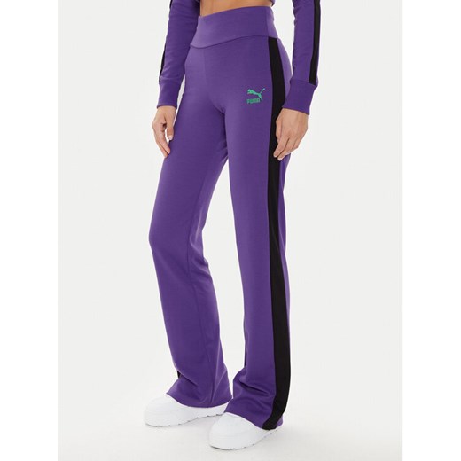 Puma Spodnie dresowe DUA LIPA 536629 Fioletowy Slim Fit ze sklepu MODIVO w kategorii Spodnie damskie - zdjęcie 182657031