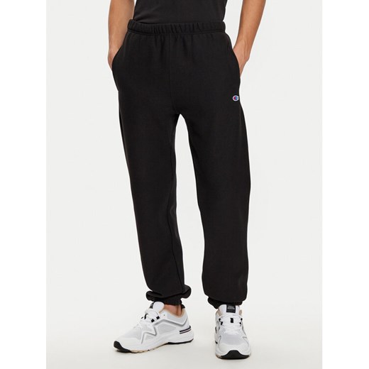 Champion Spodnie dresowe 220709 Czarny Relaxed Fit ze sklepu MODIVO w kategorii Spodnie męskie - zdjęcie 182657412