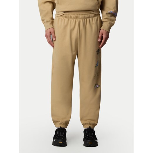 The North Face Spodnie dresowe Unisex Mountain Cleanup NF0A8C2W Beżowy Relaxed Fit ze sklepu MODIVO w kategorii Spodnie męskie - zdjęcie 182658591