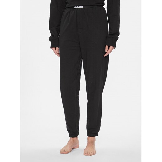 Calvin Klein Underwear Spodnie piżamowe 000QS7085E Czarny Relaxed Fit ze sklepu MODIVO w kategorii Piżamy damskie - zdjęcie 182659423