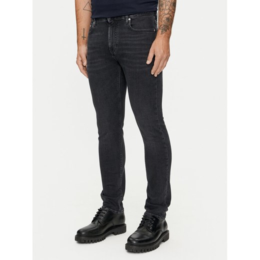 Tommy Hilfiger Jeansy Bleecker MW0MW35719 Czarny Slim Fit ze sklepu MODIVO w kategorii Jeansy męskie - zdjęcie 182659853