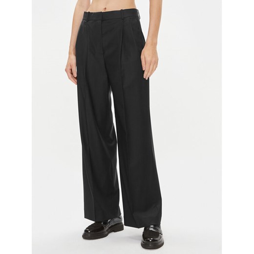 Tommy Hilfiger Spodnie materiałowe WW0WW39707 Czarny Wide Leg ze sklepu MODIVO w kategorii Spodnie damskie - zdjęcie 182660121