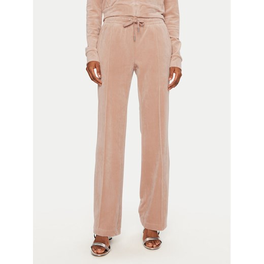 Juicy Couture Spodnie dresowe Tina JCAPW045 Beżowy Regular Fit ze sklepu MODIVO w kategorii Spodnie damskie - zdjęcie 182662920