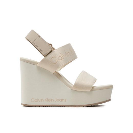 Calvin Klein Jeans Sandały Wedge Sandal Webbing In Mtl YW0YW01479 Écru ze sklepu MODIVO w kategorii Sandały damskie - zdjęcie 182665441