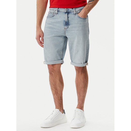 Calvin Klein Jeans Szorty jeansowe J30J327193 Niebieski Slim Fit ze sklepu MODIVO w kategorii Spodenki męskie - zdjęcie 182665850