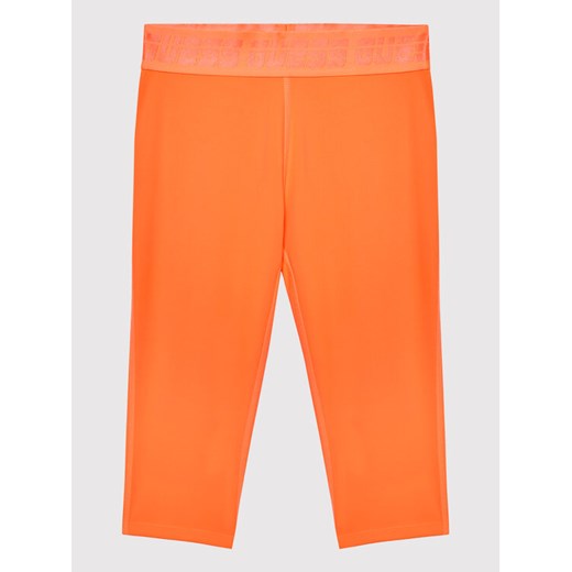 Guess Szorty rowerowe J2GB10 MC049 Pomarańczowy Slim Fit ze sklepu MODIVO w kategorii Spodnie dziewczęce - zdjęcie 182668672