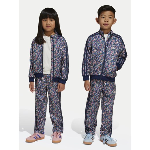 adidas Dres Liberty London Firebird JC8898 Granatowy Regular Fit ze sklepu MODIVO w kategorii Dresy dziewczęce - zdjęcie 182668682