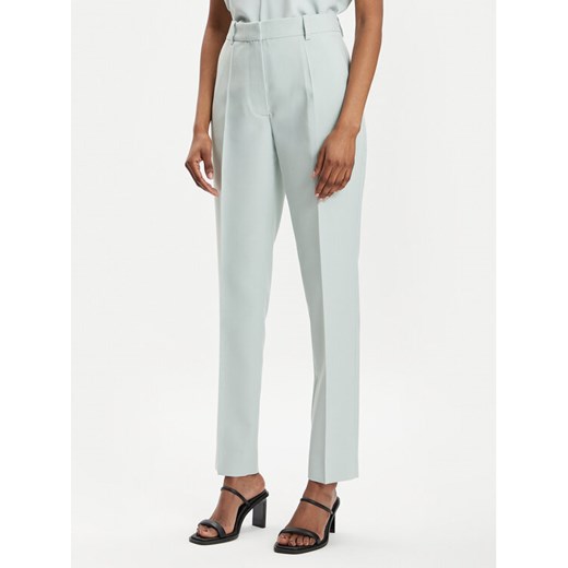 Calvin Klein Chinosy K20K205959 Zielony Slim Fit ze sklepu MODIVO w kategorii Spodnie damskie - zdjęcie 182668761