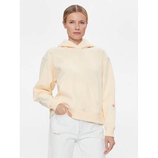 Calvin Klein Jeans Bluza Back Bold Monologo J20J222895 Żółty Relaxed Fit ze sklepu MODIVO w kategorii Bluzy damskie - zdjęcie 182670450