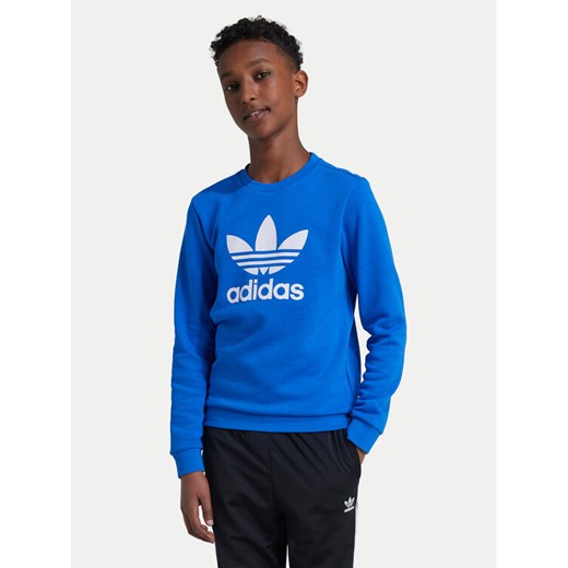 adidas Bluza Trefoil IY7438 Niebieski Regular Fit ze sklepu MODIVO w kategorii Bluzy chłopięce - zdjęcie 182670511