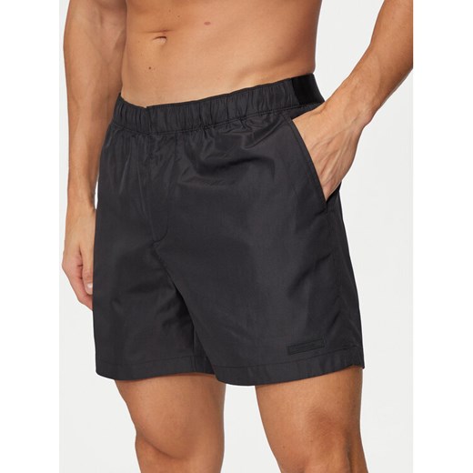 Calvin Klein Swimwear Szorty kąpielowe KM0KM01084 Czarny Slim Fit ze sklepu MODIVO w kategorii Kąpielówki - zdjęcie 182670554