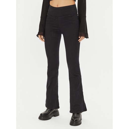 Gina Tricot Legginsy 23067 Czarny Flare Fit ze sklepu MODIVO w kategorii Spodnie damskie - zdjęcie 182670723
