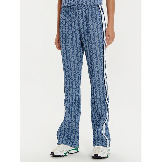 Lacoste Spodnie dresowe XF9313 Niebieski Regular Fit ze sklepu MODIVO w kategorii Spodnie damskie - zdjęcie 182671122