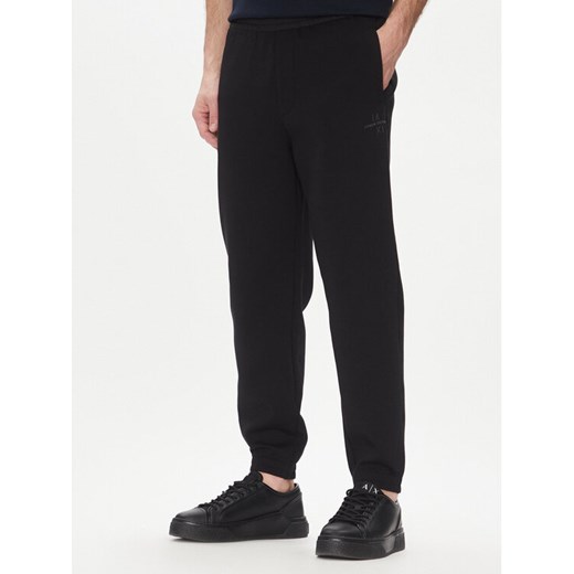 Armani Exchange Spodnie dresowe XM000516 AF13047 MC105 Czarny Regular Fit ze sklepu MODIVO w kategorii Spodnie męskie - zdjęcie 182672653