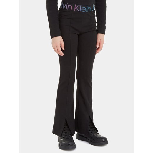 Calvin Klein Jeans Legginsy IG0IG02179 Czarny Slim Fit ze sklepu MODIVO w kategorii Spodnie dziewczęce - zdjęcie 182673234