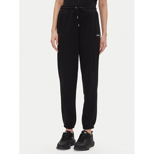 DKNY Sport Spodnie dresowe DP5P3632 Czarny Relaxed Fit ze sklepu MODIVO w kategorii Spodnie damskie - zdjęcie 182673334