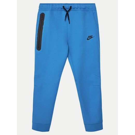 Nike Spodnie dresowe FD3287 Niebieski Standard Fit ze sklepu MODIVO w kategorii Spodnie chłopięce - zdjęcie 182673842