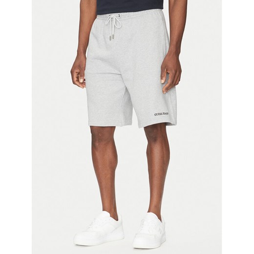 Guess Jeans Szorty sportowe M5GD49 KCPR1 Szary Regular Fit ze sklepu MODIVO w kategorii Spodenki męskie - zdjęcie 182674634