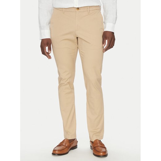 Michael Kors Chinosy CS4301KDR2 Beżowy Slim Fit ze sklepu MODIVO w kategorii Spodnie męskie - zdjęcie 182675604