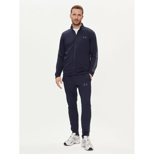 Under Armour Dres Ua Knit Track Suit 1357139-410 Granatowy Fitted Fit ze sklepu MODIVO w kategorii Spodnie męskie - zdjęcie 182675723