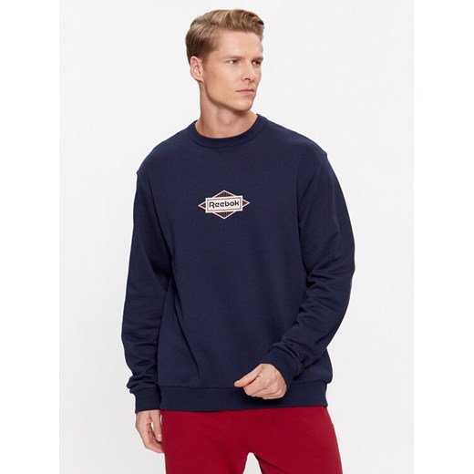 Reebok Bluza Sporting Goods IM1503 Granatowy Regular Fit ze sklepu MODIVO w kategorii Bluzy męskie - zdjęcie 182675802