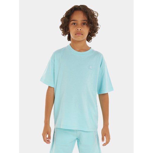 Calvin Klein Jeans T-Shirt Mono Mini Badge IU0IU00580 M Niebieski Regular Fit ze sklepu MODIVO w kategorii T-shirty chłopięce - zdjęcie 182675884