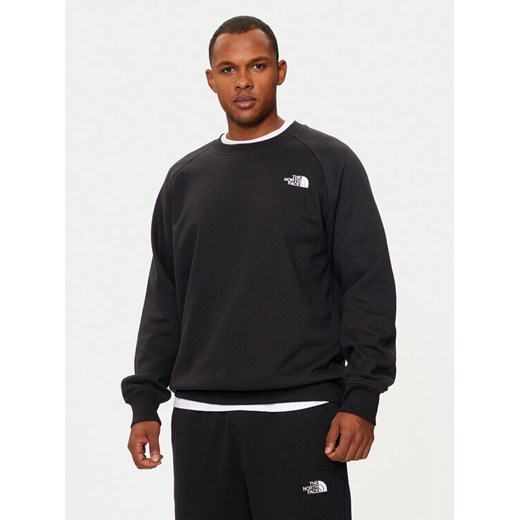 The North Face Bluza Redbox NF0A89FA Czarny Regular Fit ze sklepu MODIVO w kategorii Bluzy męskie - zdjęcie 182676660