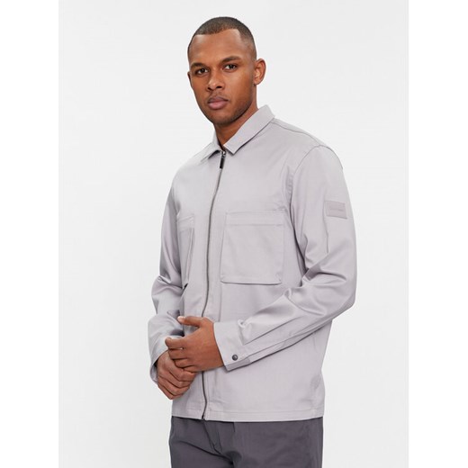 Calvin Klein Kurtka przejściowa Cotton 3D Pockets Overshirt K10K112356 Szary Regular Fit ze sklepu MODIVO w kategorii Kurtki męskie - zdjęcie 182677090