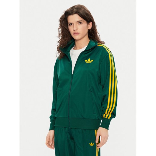 adidas Bluza adicolor Classic Firebird JP2299 Zielony Loose Fit ze sklepu MODIVO w kategorii Bluzy damskie - zdjęcie 182677140