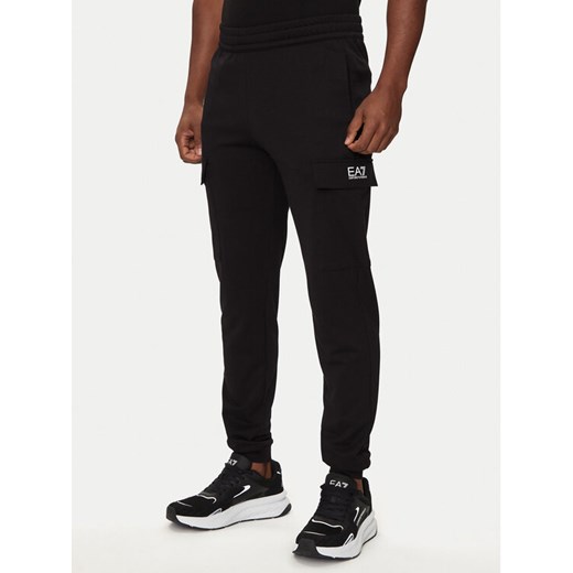 EA7 Emporio Armani Spodnie dresowe 8NPP67 PJVRZ 1200 Czarny Regular Fit ze sklepu MODIVO w kategorii Spodnie męskie - zdjęcie 182677810
