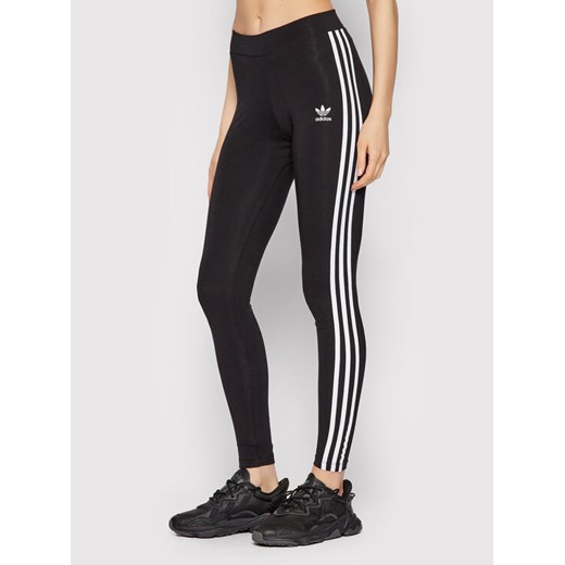 adidas Legginsy adicolor Classics 3-Stripes HD2350 Czarny Tight Fit ze sklepu MODIVO w kategorii Spodnie damskie - zdjęcie 182677871