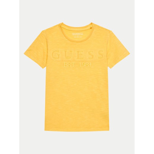 Guess T-Shirt L4GI09 K6XN4 Żółty Regular Fit ze sklepu MODIVO w kategorii T-shirty chłopięce - zdjęcie 182677970