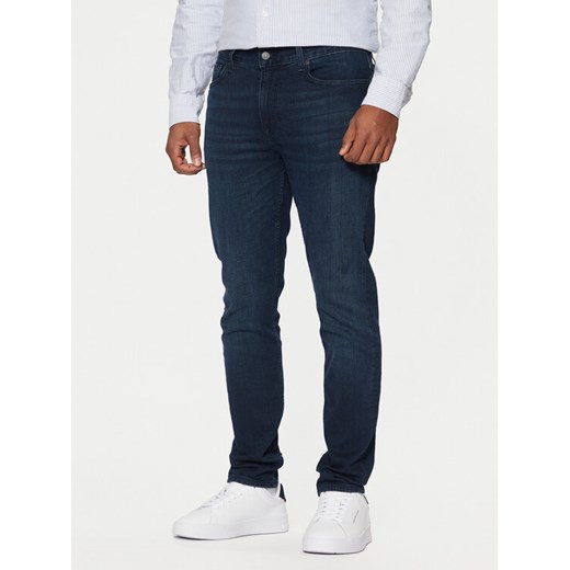 Tommy Hilfiger Jeansy Bleecker MW0MW39042 Niebieski Slim Fit ze sklepu MODIVO w kategorii Jeansy męskie - zdjęcie 182678342
