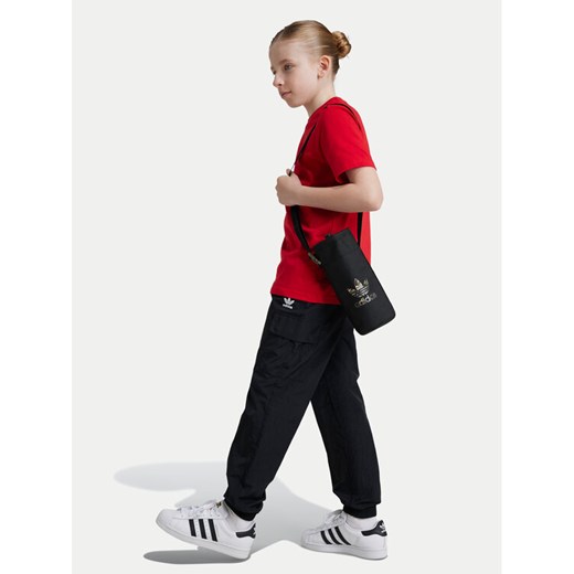 adidas Spodnie dresowe IW3505 Czarny Regular Fit ze sklepu MODIVO w kategorii Spodnie chłopięce - zdjęcie 182678680