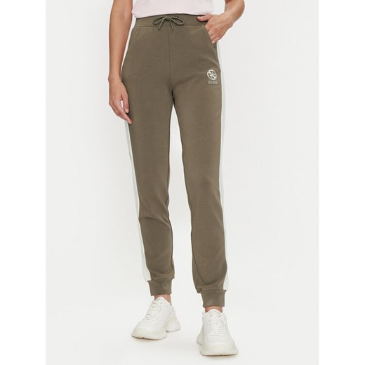 Guess Spodnie dresowe Elea V4YB02 KCDN0 Brązowy Regular Fit ze sklepu MODIVO w kategorii Spodnie damskie - zdjęcie 182679914