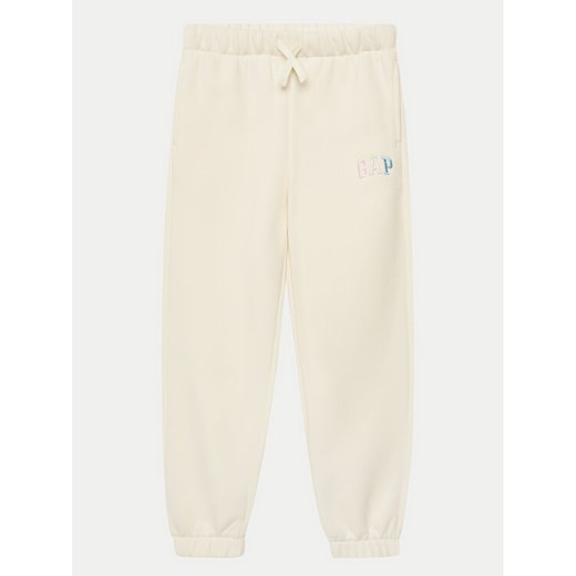 Gap Spodnie dresowe 709023-00 Beżowy Regular Fit ze sklepu MODIVO w kategorii Spodnie dziewczęce - zdjęcie 182681053