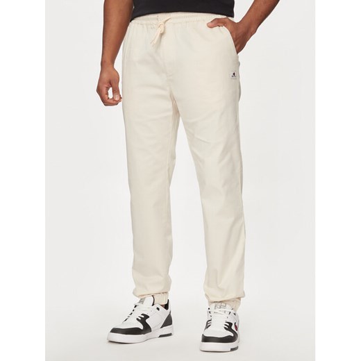 Champion Spodnie dresowe 219865 Beżowy Custom Fit Champion S MODIVO