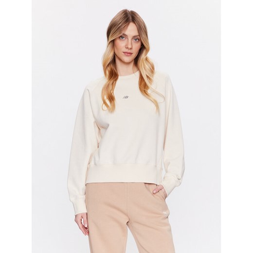 New Balance Bluza WT31500 Écru Oversize ze sklepu MODIVO w kategorii Bluzy damskie - zdjęcie 182683220